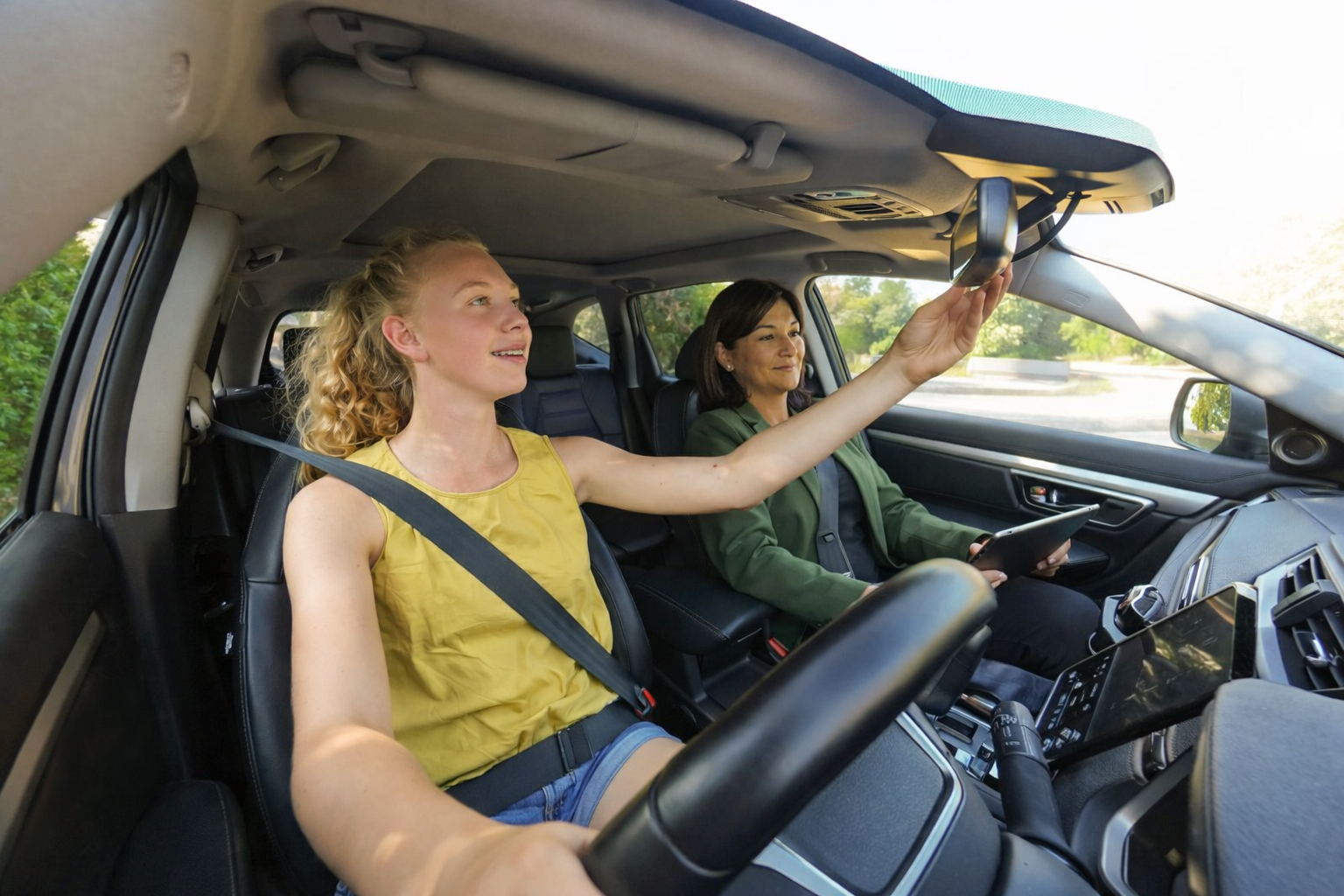Professional driving instructor coaching a learner in Melton