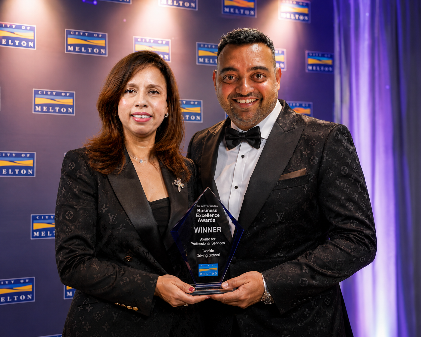 Twinkle and Chandresh holding City of Melton Business Excellence Award 2025